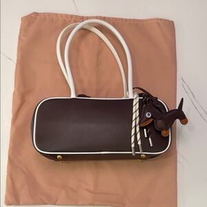 Brown Shoulder Bag with White Handles and bag charms